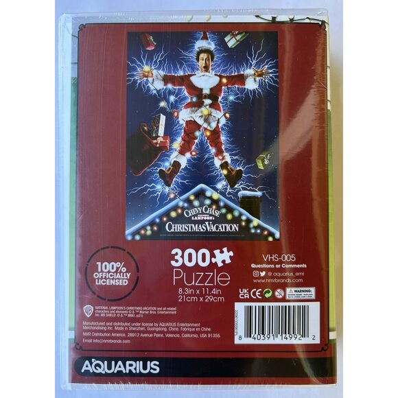 Chevy Chase National Lampoon's Christmas Vacation 300 Piece Puzzle in VHS Box - Picture 2 of 5